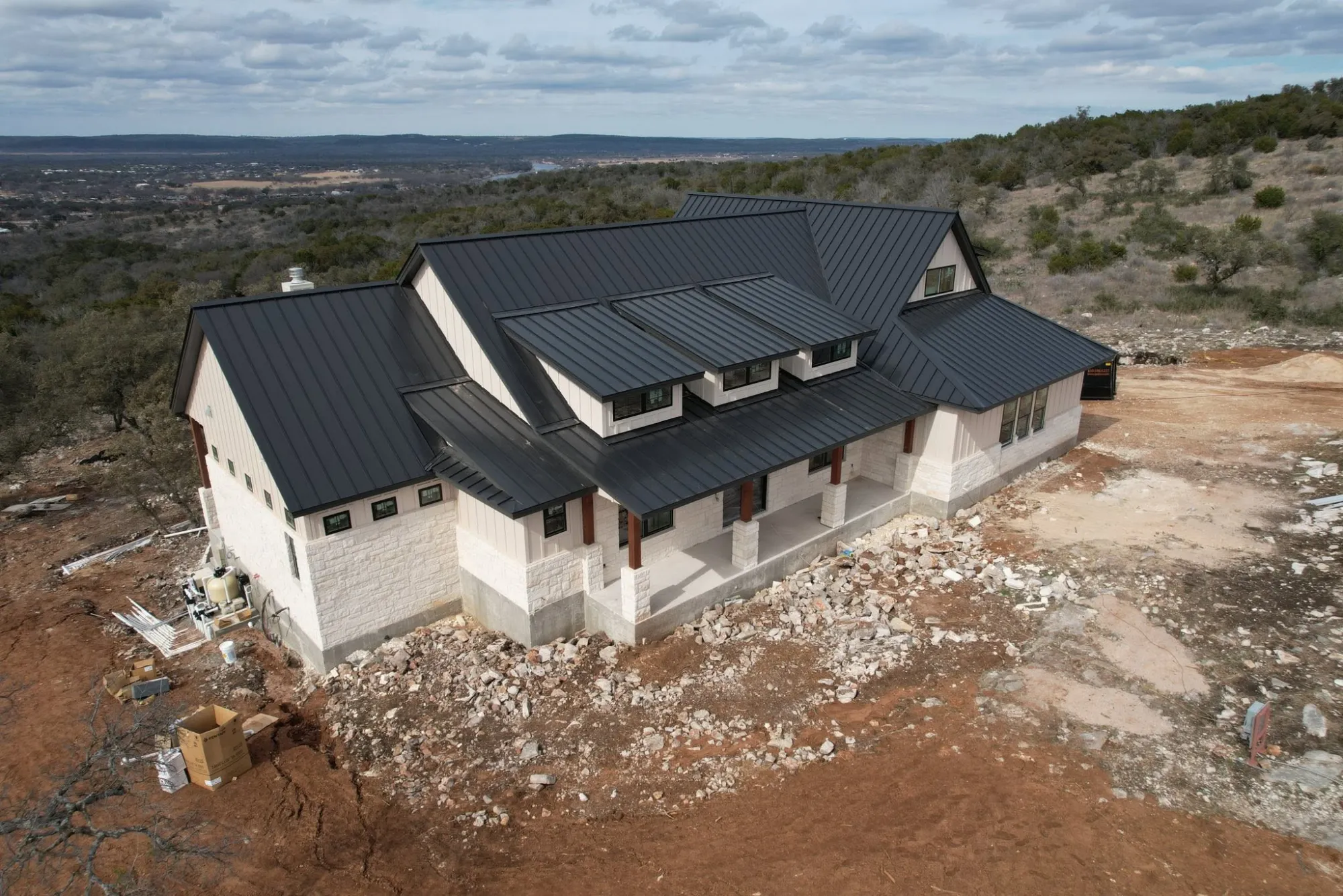 Standing seam metal roof on a hilltop home